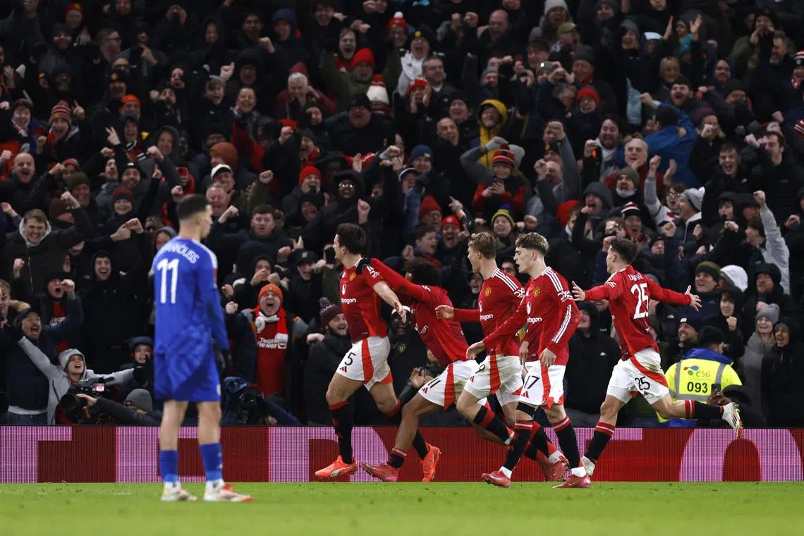 Soccer Football - FA Cup - Fourth Round - Manchester United v Leicester City - Old Trafford, Manchester, Britain - February 7, 2025 Manchester United's Harry Maguire celebrates scoring their second goal with teammates Action Images via Reuters/Jason Cairnduff