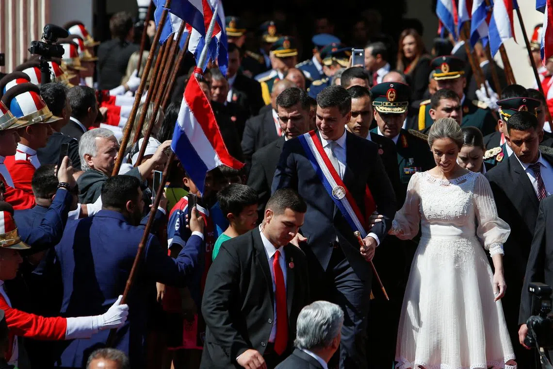 Paraguay's new President Santiago Pena and first lady Leticia Ocampos leave the Metropolitan Cathedral after the 'Te Deum', in Asuncion, Paraguay August 15, 2023. REUTERS/Cesar Olmedo 