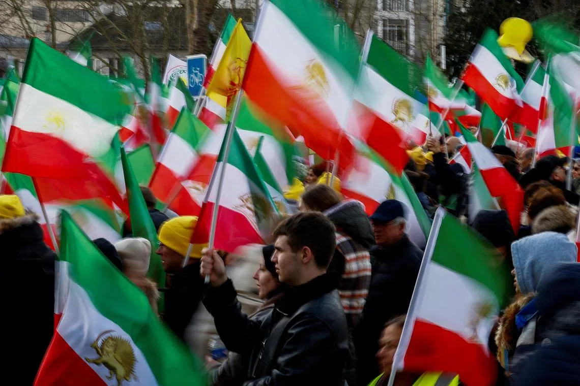 Supporters of Iranian opposition group National Council of Resistance of Iran (NCRI) gather to protest against the nuclear program and the detention of EU nationals as tensions escalate between France and Iran in Paris, France, February 8, 2025. REUTERS/Gonzalo Fuentes