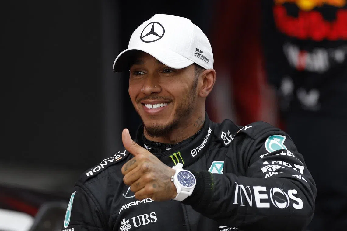 Mercedes' Lewis Hamilton celebrates after finishing second pace in the Spanish Grand Prix.