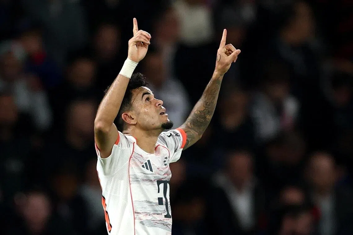 Bayern Munich's Luis Diaz celebrates scoring their second goal against Bayern Munich in the Champions League.