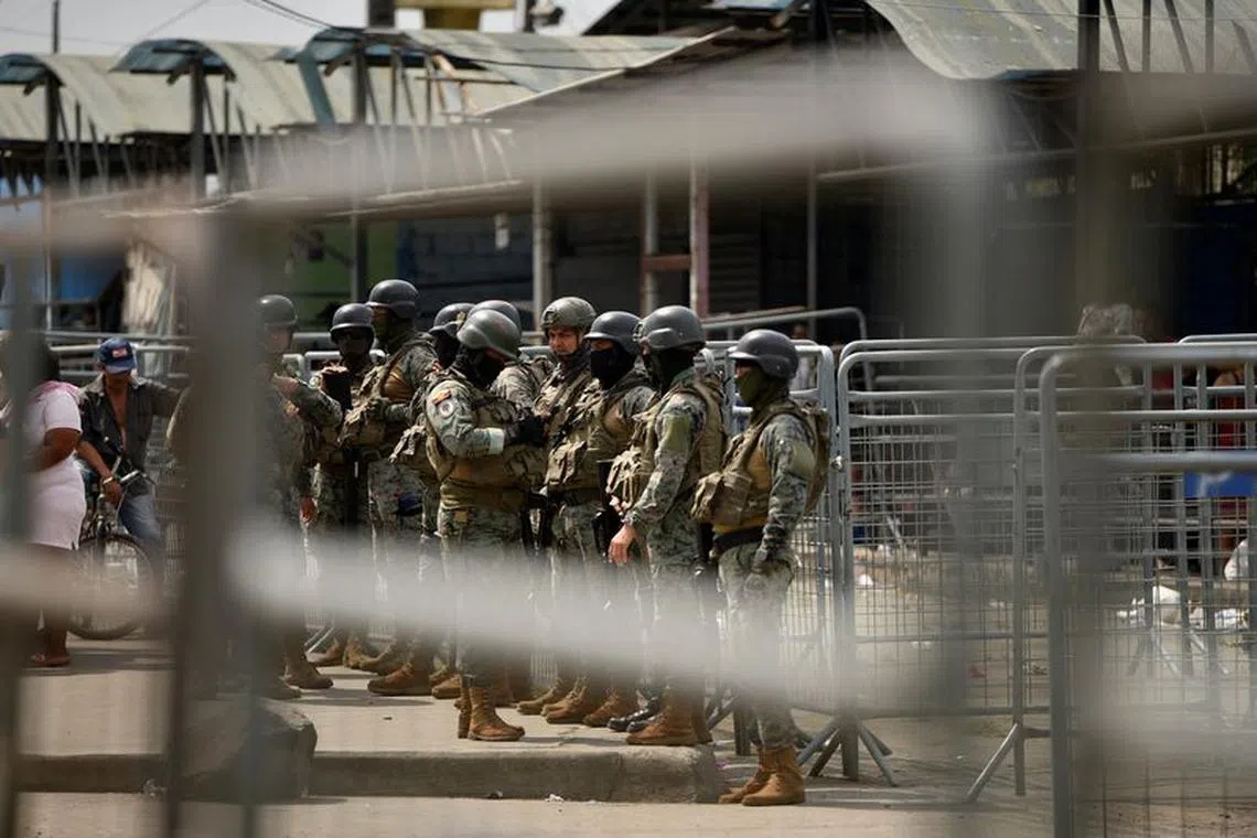 Ecuador's security forces stand guard outside the prison in Guayaquil, after Ecuador's government on Tuesday declared a 60-day state of emergency throughout the country's prisons and authorized armed forces to retake control of jails, following a wave of violence that left 18 dead over the weekend, in Guayaquil, Ecuador July 25, 2023. REUTERS/Vicente Gaibor del Pino/ File Photo