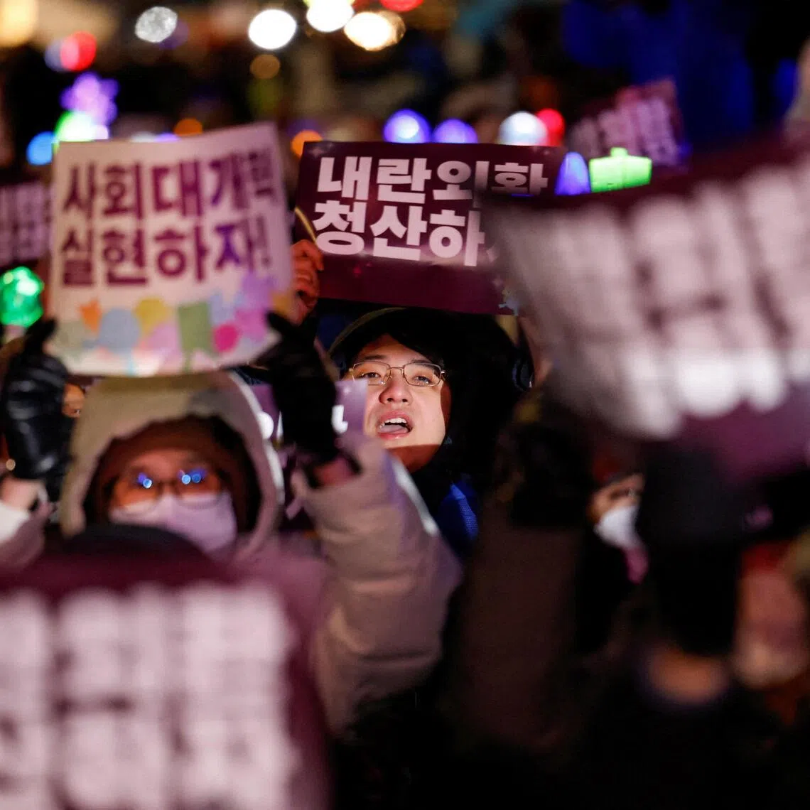 Anti-Yoon protesters attend a rally to mark the first anniversary of former president Yoon Suk Yeol's Dec 3, 2024, martial law declaration, near the National Assembly in Seoul, South Korea.