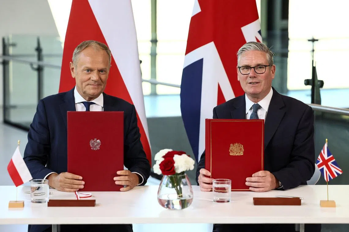 Britain's Prime Minister Keir Starmer and Poland's Prime Minister Donald Tusk attend a signing ceremony of a UK-Poland defence and security treaty at the Battle of Britain Bunker in Uxbridge, Britain, May 27, 2026. REUTERS/Jack Taylor/Pool
