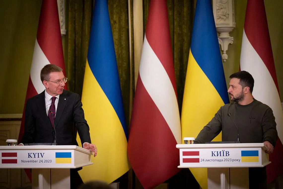Ukraine's President Volodymyr Zelenskiy and Latvian President Edgars Rinkevics attend a joint press conference, amid Russia's attack on Ukraine, in Kyiv, Ukraine November 24, 2023.   Ukrainian Presidential Press Service/Handout via REUTERS