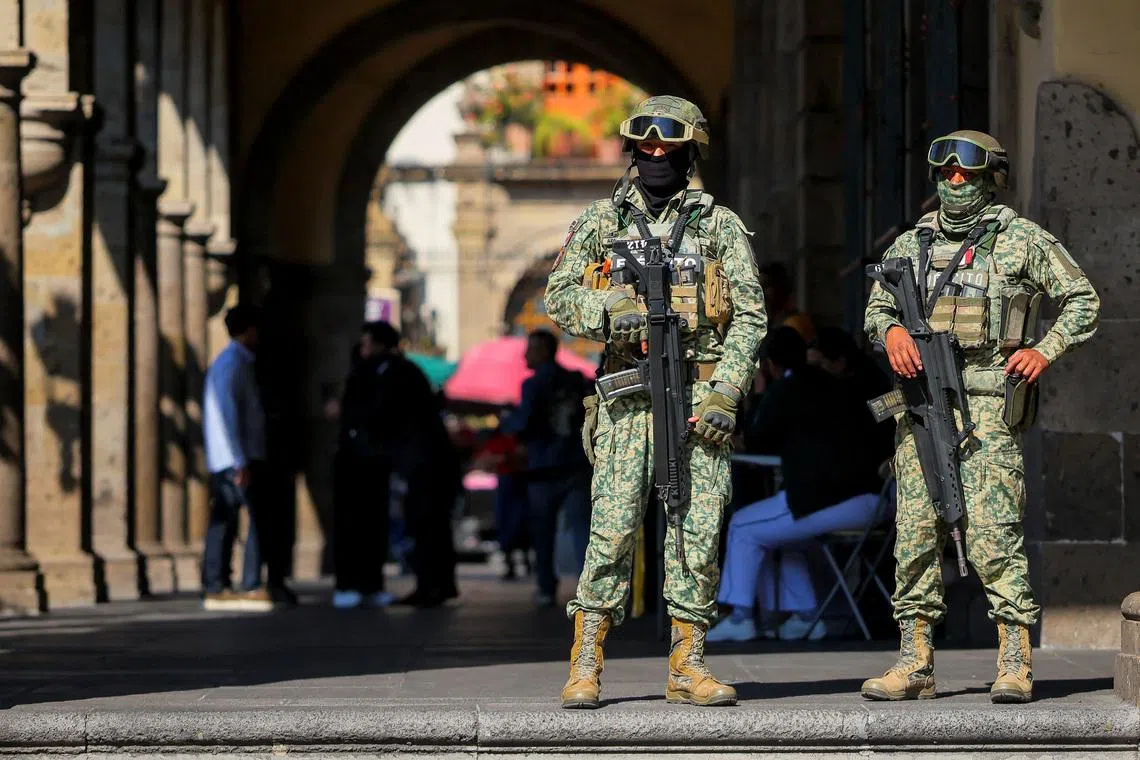 Soldiers keep watch in downtown Guadalajara as the city prepares for the 2026 FIFA World Cup, jointly hosted by the United States, Canada and Mexico, in Guadalajara, Mexico, March 24, 2026. REUTERS/Eloisa Sanchez/ File Photo
