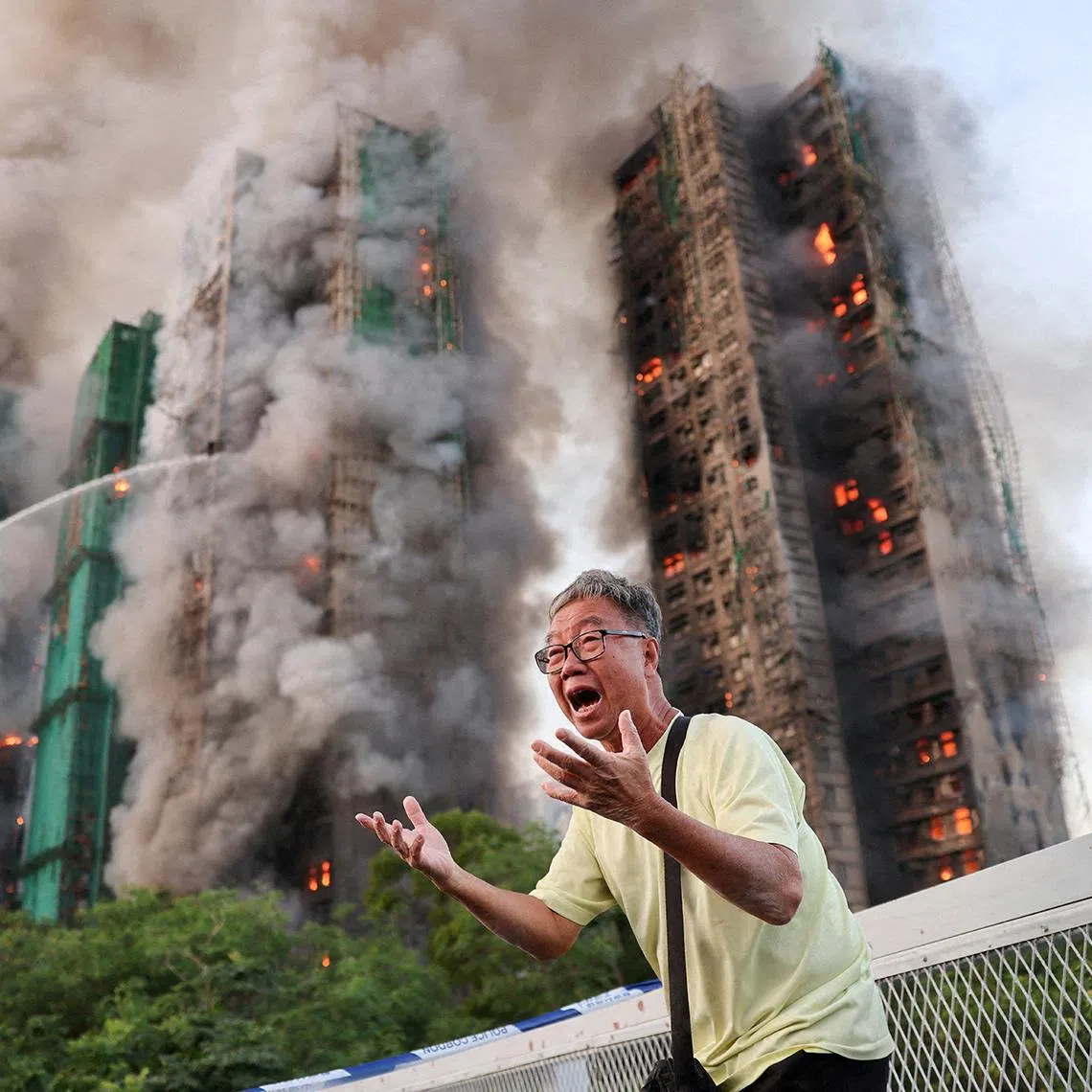 (STRICTLY FOR HFWPP ONLY, ONE TIME USAGE, NO CROPPING ACCORDING TO USAGE RULE) MAIN PIX. Title: A Desperate Plea Credit: © Tyrone Siu, Reuters Caption: Mr Wong cries out in anguish as fire engulfs the Tai Po housing complex he calls home. Moments earlier, he phoned his wife, who was trapped in the building, and they exchanged what would be their final words. Hong Kong, 26 November 2025. Story: A massive fire at the Wang Fuk Court housing complex in Tai Po claimed 168 lives, becoming Hong Kong’s deadliest fire since 1948. While no official cause has been reported, investigations by Hong Kong authorities found that bamboo scaffolding, construction netting, and flammable Styrofoam boards on windows acted as accelerants for the fire, trapping residents inside. More than 2,000 firefighters were involved in rescue efforts, killing one and injuring twelve.
