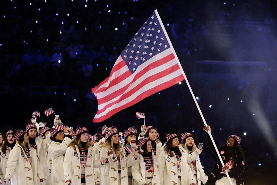 FILE PHOTO: Milano Cortina 2026 Olympics - Opening Ceremony - San Siro Stadium, Milan, Italy - February 06, 2026. Flagbearer Erin Jackson of United States in the athletes parade during the opening ceremony REUTERS/File Photo