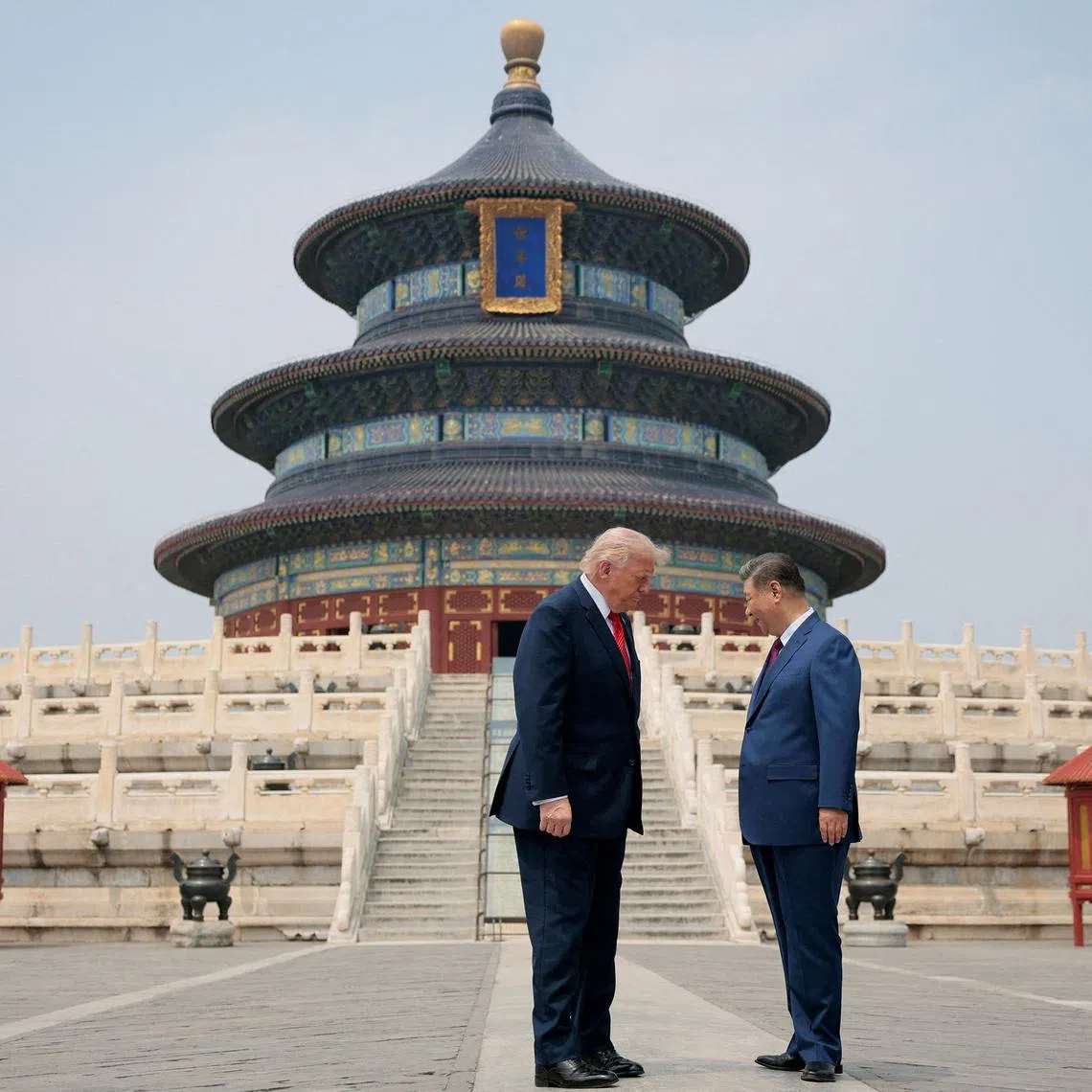 U.S. President Donald Trump and Chinese President Xi Jinping stand together as they tour the Temple of Heaven in Beijing, China, May 14, 2026. REUTERS/Evan Vucci TPX IMAGES OF THE DAY