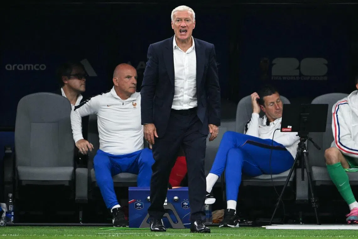 France's head coach Didier Deschamps (C) reacts in the techinal area during the 2026 World Cup football tournament semi-final match between France and Spain at the Dallas Stadium in Arlington on July 14, 2026.  (Photo by RONALDO SCHEMIDT / AFP)