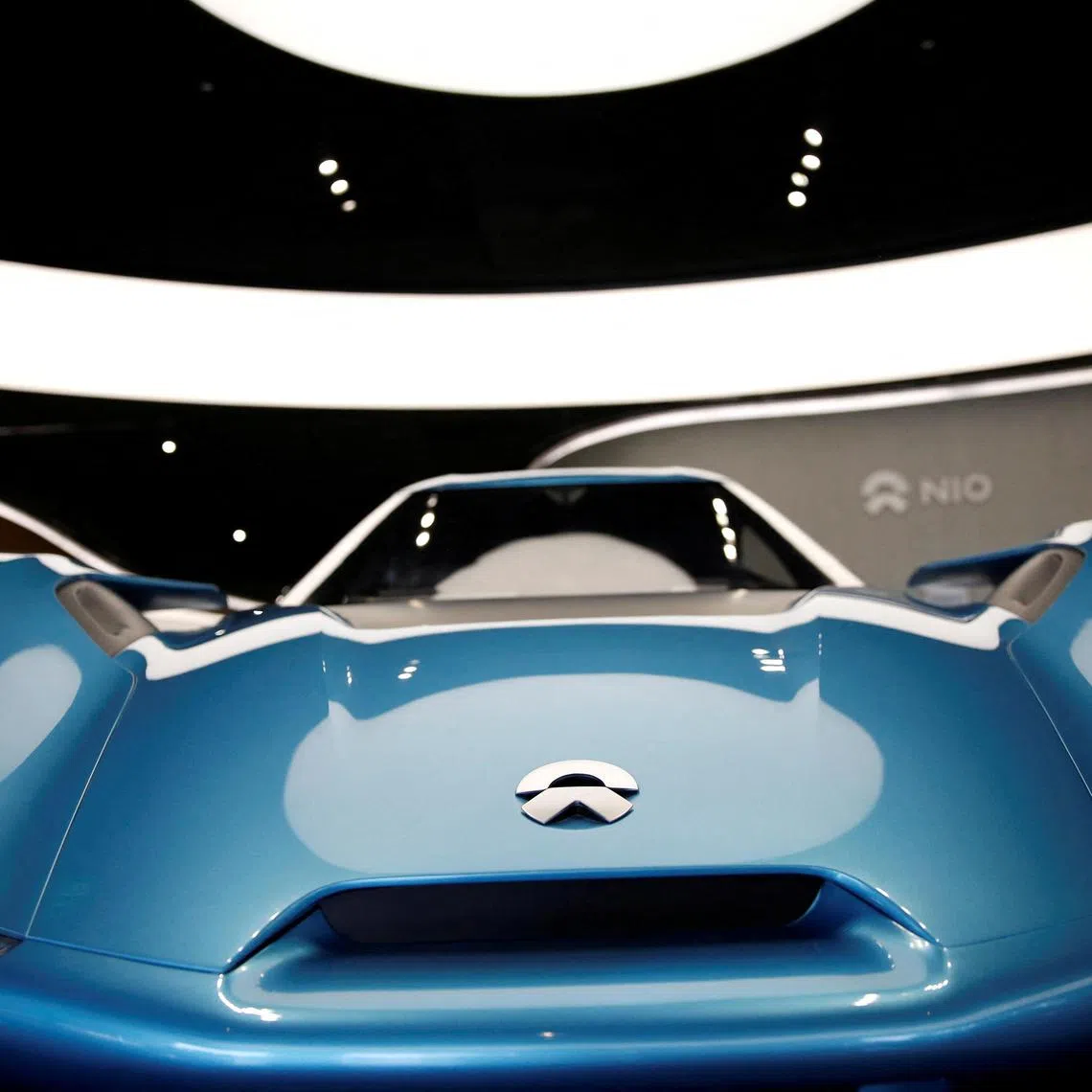 Coming soon: An electric Nio EP9 sports car in a Beijing showroom. 