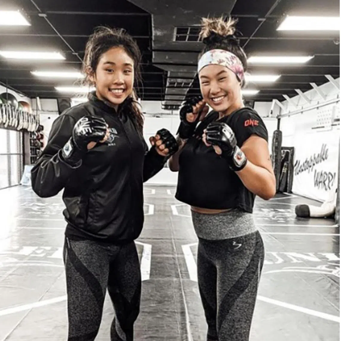  The late Victoria Lee (left) with sister Angela trained in the family-owned United MMA Hawaii Gym in Waipahu. 