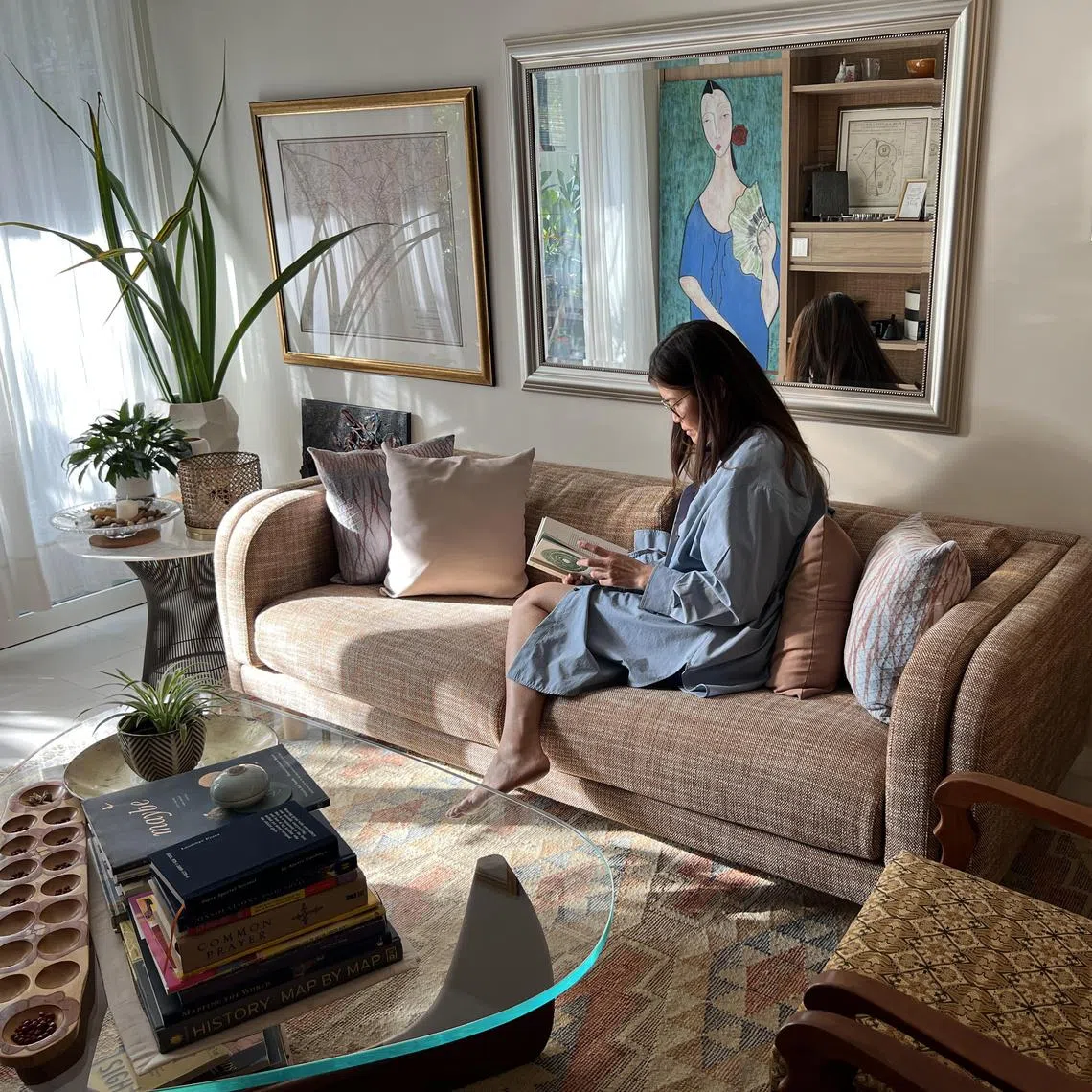 Melissa Kwee, former CEO of the National Volunteer & Philanthropy Centre, reading. 