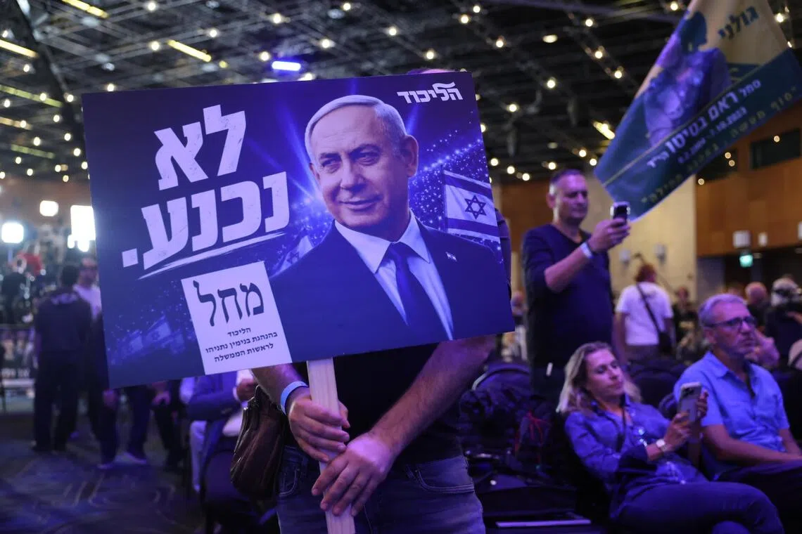 epa13335444 A supporter of Israeli Prime Minister Benjamin Netanyahu attends a Likud party election event in Jerusalem, 27 October 2026. Israelis headed to the polls in the first nationwide 26th Knesset (legislative) elections since the Hamas-led 07 October 2023 attack.  EPA/ABIR SULTAN