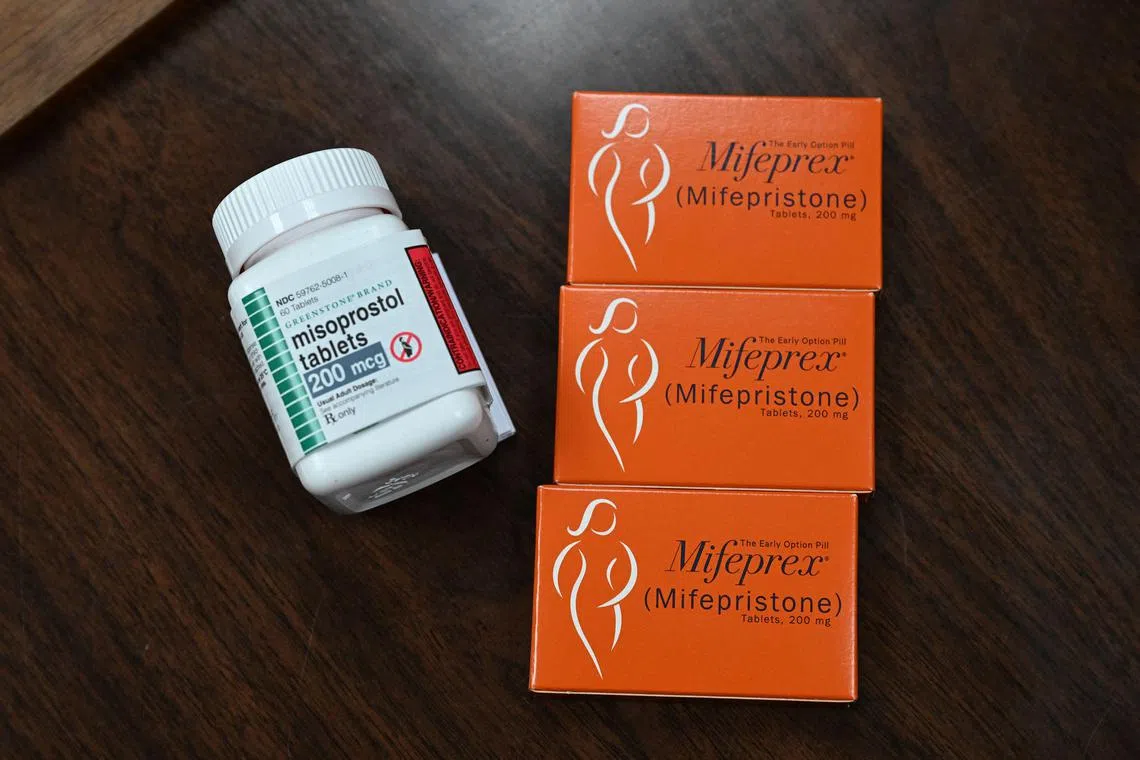 (FILES) Mifepristone (Mifeprex) and Misoprostol, the two drugs used in a medication abortion, are seen at the Women's Reproductive Clinic, which provides legal medication abortion services, in Santa Teresa, New Mexico, on June 17, 2022. Mifepristone is taken first to stop the pregnancy, followed by Misoprostol to induce bleeding. A US federal appeals court on August 16, 2023 imposed restrictions on a widely used abortion pill, but the ruling will remain on hold as the Supreme Court decides whether to hear the case. (Photo by Robyn Beck / AFP) / RESTRICTED TO EDITORIAL USE