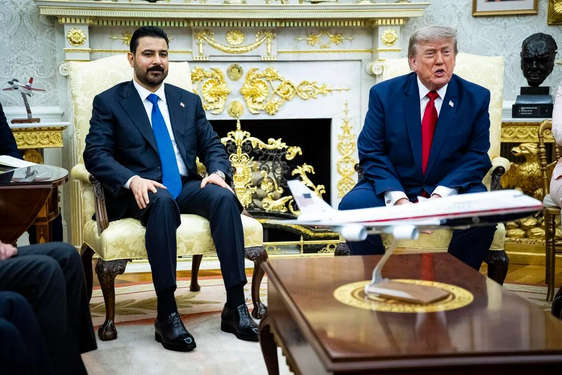 US President Donald Trump (right) and Iraqi Prime Minister Ali al-Zaidi during a meeting in the Oval Office of the White House in Washington on July 14.
