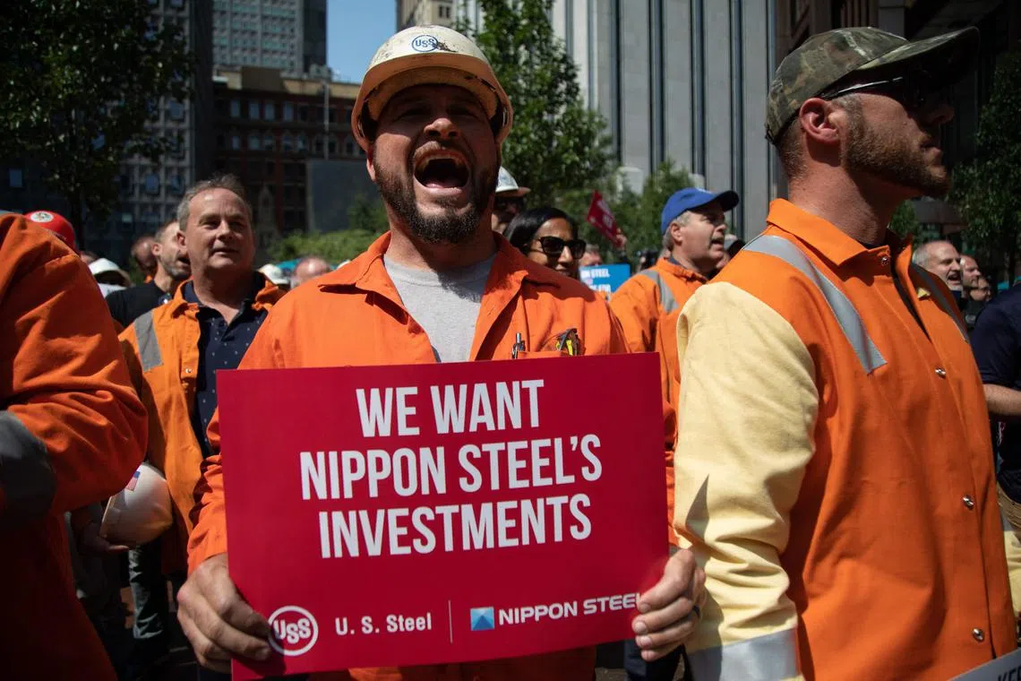 US Steel workers rally outside the company's headquarters in Pittsburgh, Pennsylvania, supporting the takeover by Japan's Nippon Steel, on Sept 4, 2024. 