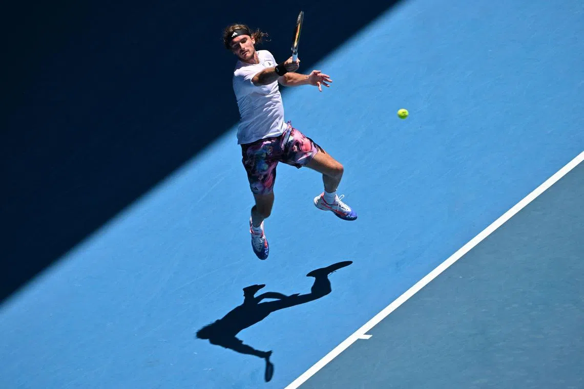 Greece's Stefanos Tsitsipas hits a return against Netherlands' Tallon Griekspoor during their men's singles match on day five of the Australian Open.