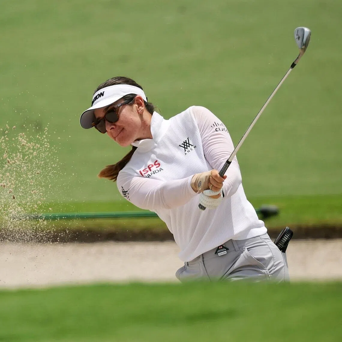 Hannah Green of Australia hitting a shot from the bunker during round 3 of HSBC Women's World Championship at the Tanjong Course, Sentosa Golf Club, on Feb 28, 2026. ST PHOTO: KEVIN LIM kkgolf28