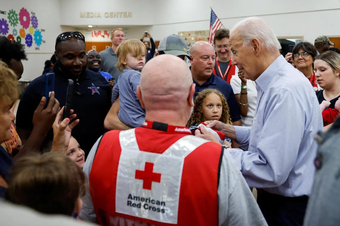US President Joe Biden visits a school in Live Oak, Florida, to meet people affected by Hurricane Idalia.