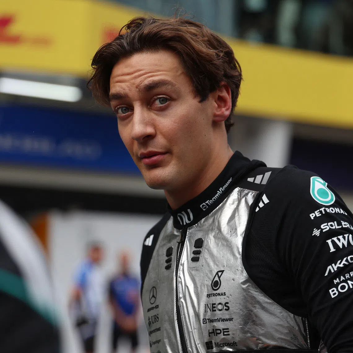 Mercedes’ George Russell at the pit lane as the Bahrain Grand Prix is delayed due to rain at the Sepang International Circuit on Oct 4.