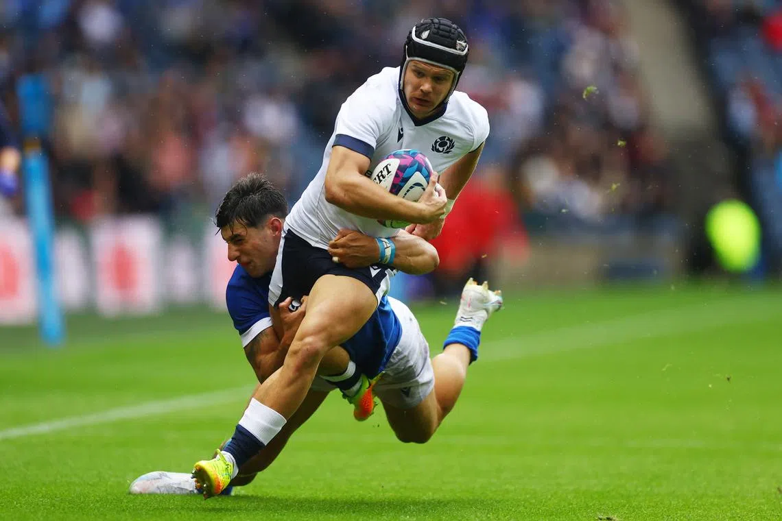 FILE PHOTO: Rugby Union - Rugby World Cup 2023 warm up - Scotland v Italy - Murrayfield Stadium, Edinburgh, Scotland, Britain - July 29, 2023 Scotland's Darcy Graham in action with Italy's Tommaso Menoncello Action Images via Reuters/Lee Smith/File Photo