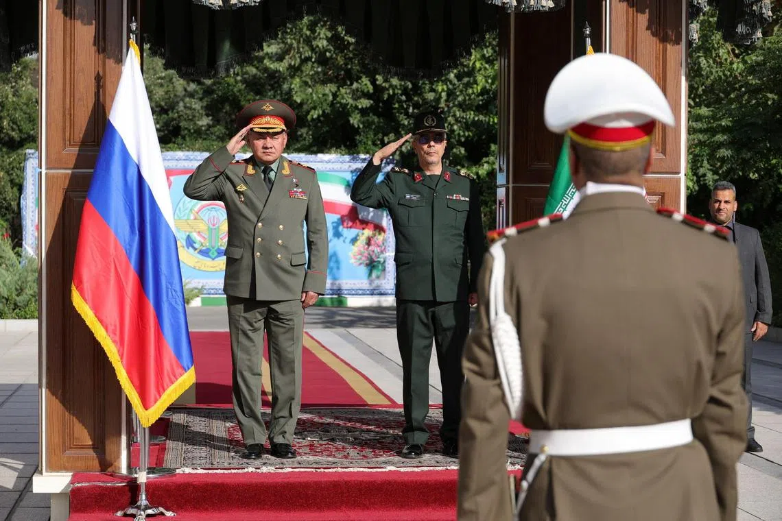 Russian Defence Minister Sergei Shoigu and Iranian Armed Forces Chief of Staff, Major General Mohammad Bagheri take part in an official welcoming ceremony in Tehran, Iran, September 19, 2023. Russian Defence Ministry/Handout via REUTERS ATTENTION EDITORS - THIS IMAGE WAS PROVIDED BY A THIRD PARTY. NO RESALES. NO ARCHIVES. MANDATORY CREDIT.