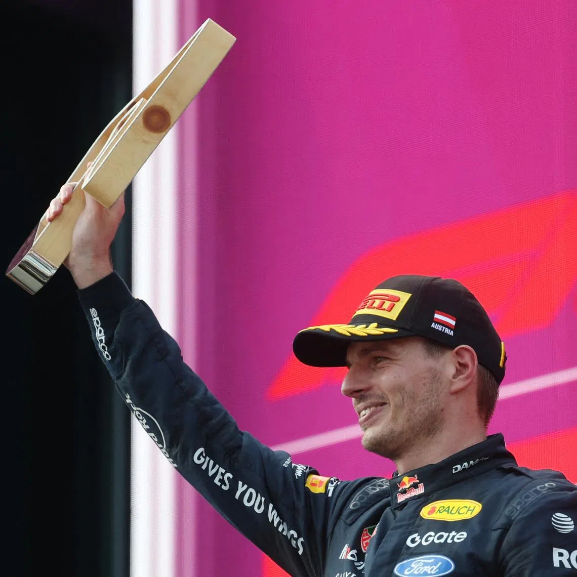 Red Bull’s Max Verstappen celebrating with a trophy on the podium after finishing second in the Austrian Grand Prix at the Red Bull Ring in Spielberg on June 28.