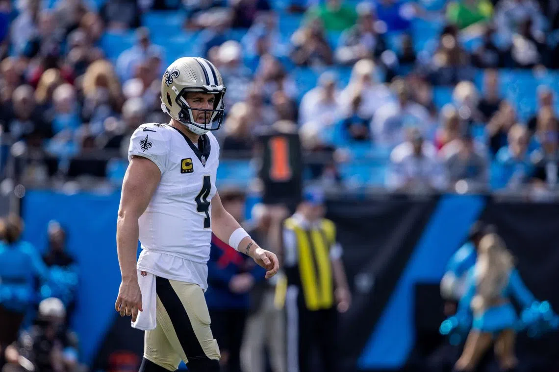FILE PHOTO: Nov 3, 2024; Charlotte, North Carolina, USA; New Orleans Saints quarterback Derek Carr (4) during the first quarter against the Carolina Panthers at Bank of America Stadium. Mandatory Credit: Scott Kinser-Imagn Images/File Photo