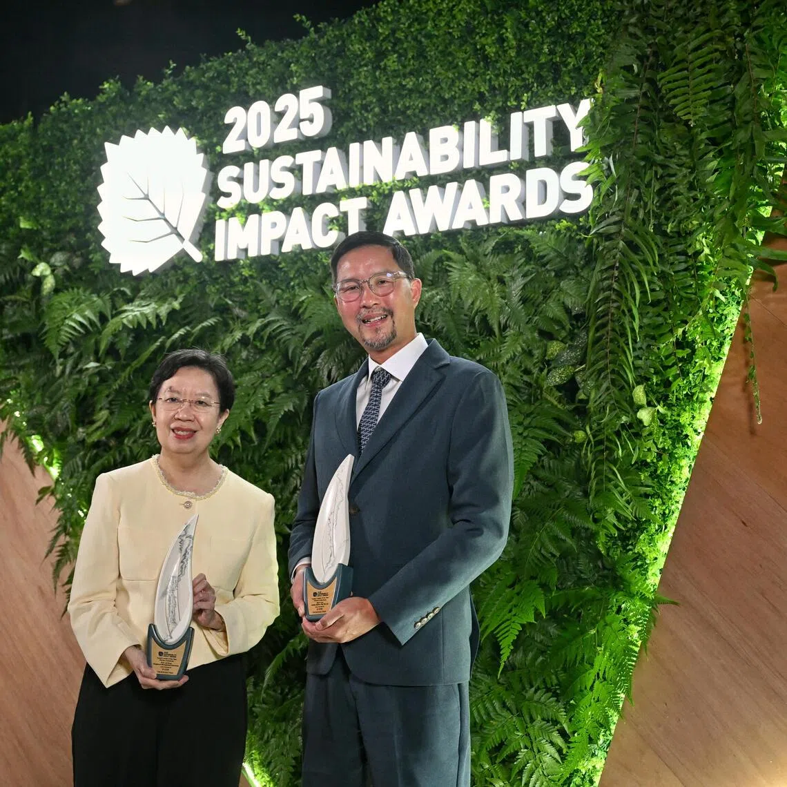 Impact Leader of the Year award recipients Lily Kong and Bjorn Low at the Sustainability Impact Awards ceremony on Sept 25.
