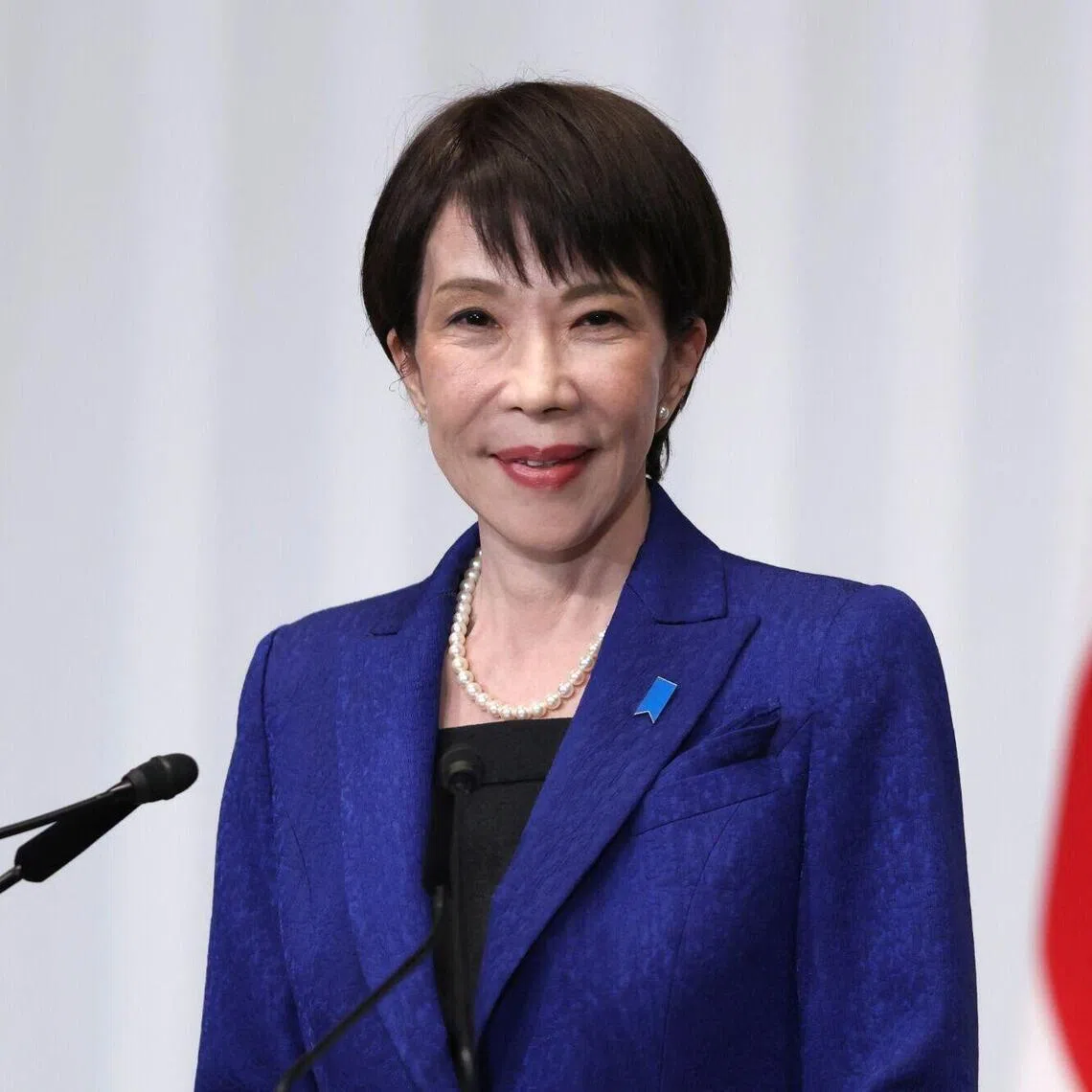 Sanae Takaichi, Japan's prime minister and president of the Liberal Democratic Party (LDP), poses for a photograph ahead of a news conference at the party's headquarters in Tokyo, Japan, on Monday, Feb. 9, 2026. Takaichi’s ruling coalition secured an overwhelming majority in Sunday’s lower-house vote, giving her a clear mandate to pursue fiscal expansionary policies that have already driven Japanese stocks to all-time highs. Photographer: Kiyoshi Ota/Bloomberg