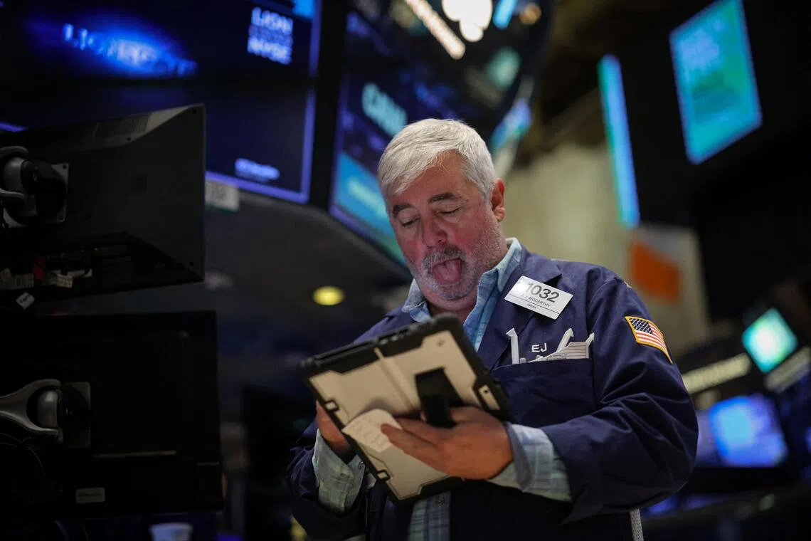 A trader working on the floor at the New York Stock Exchange, in New York City, on Dec 5.