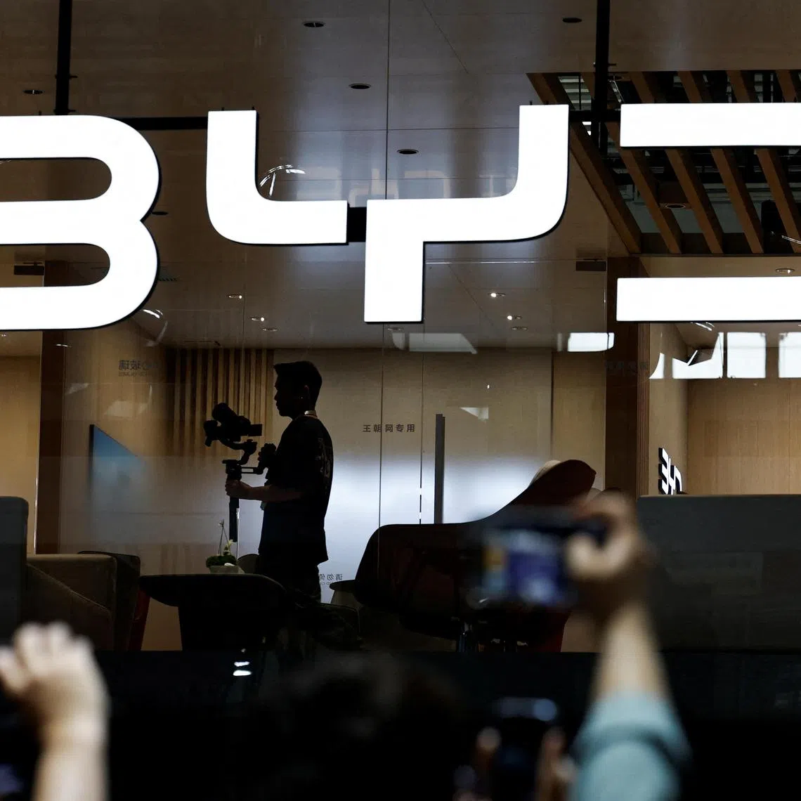 FILE PHOTO: The BYD logo is displayed at the Beijing International Automotive Exhibition, or Auto China 2024, in Beijing, China, April 25, 2024. REUTERS/Tingshu Wang/File Photo