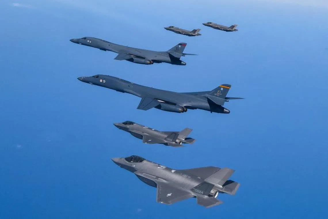 FILE PHOTO: US Air Force B-1B bombers, F-16 fighter jets and South Korean Air Force F-35A take part in a joint air drill, South Korea, March 19, 2023.  South Korean Defence Ministry/Handout via REUTERS   ATTENTION EDITORS - THIS IMAGE HAS BEEN SUPPLIED BY A THIRD PARTY./File Photo