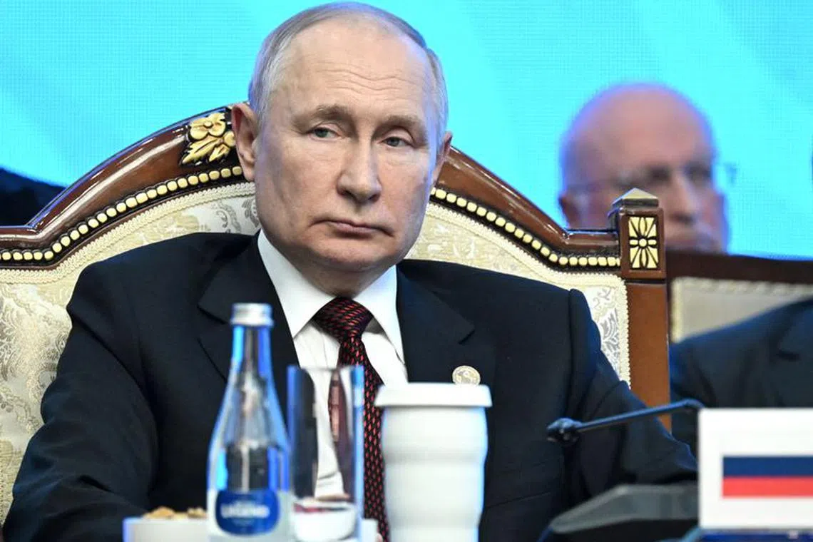 Russian President Vladimir Putin attends a signing ceremony at the Commonwealth of Independent States (CIS) leaders' summit in Bishkek, Kyrgyzstan, October 13, 2023. Sputnik/Pavel Bednyakov/Pool via REUTERS ATTENTION EDITORS - THIS IMAGE WAS PROVIDED BY A THIRD PARTY.