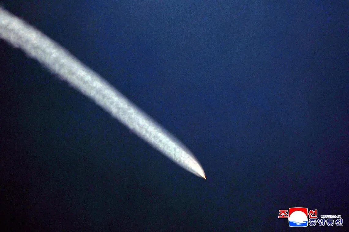 An object that appears to be a missile flies through the air, as the Missile General Bureau of North Korea claims they successfully conducted a test of a major weapons system on October 22, 2025, at an unspecified location, in this photo released by North Korea's official Korean Central News Agency on October 23, 2025. 