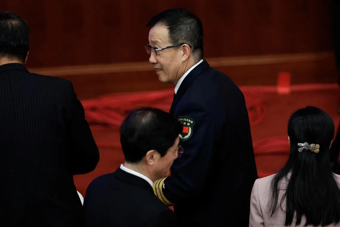 Chinese Defense Minister Dong Jun arrives for the closing session of the National People's Congress (NPC) at the Great Hall of the People in Beijing, China March 11, 2024. REUTERS/Tingshu Wang/File Photo