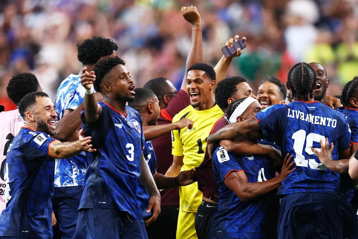 Cape Verde’s Diney Borges and teammates celebrate after the match as they qualify for the knockout stages of the World Cup.