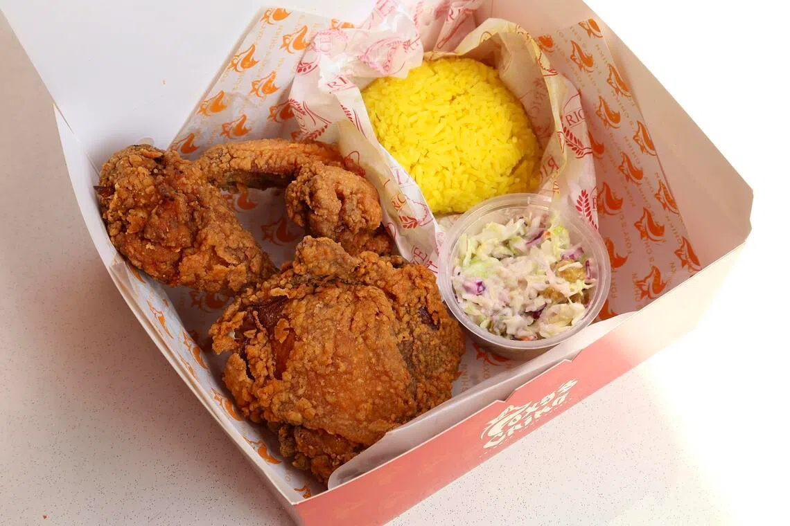 3 Piece Chikn Set comes with the eatery’s version of nasi kuning.
