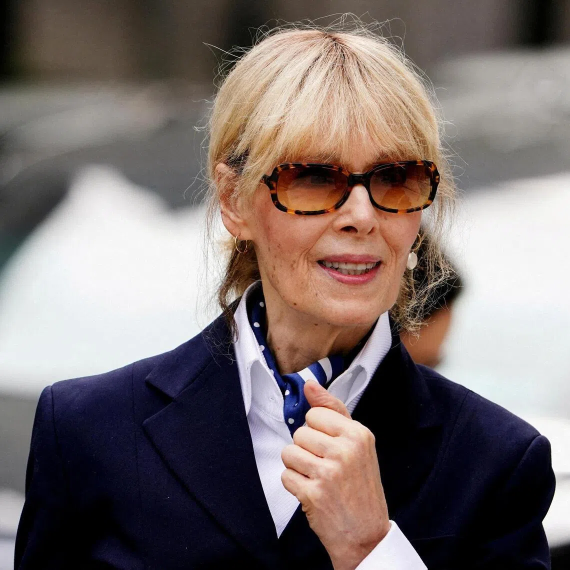 Writer E. Jean Carroll accused the president of assaulting her in a dressing room of a New York department store in 1996.