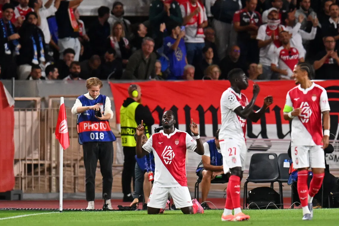 Soccer Football - UEFA Champions League - AS Monaco v Manchester City - Stade Louis II, Monaco - October 1, 2025 AS Monaco's Jordan Teze celebrates scoring their first goal REUTERS/Alexandre Dimou