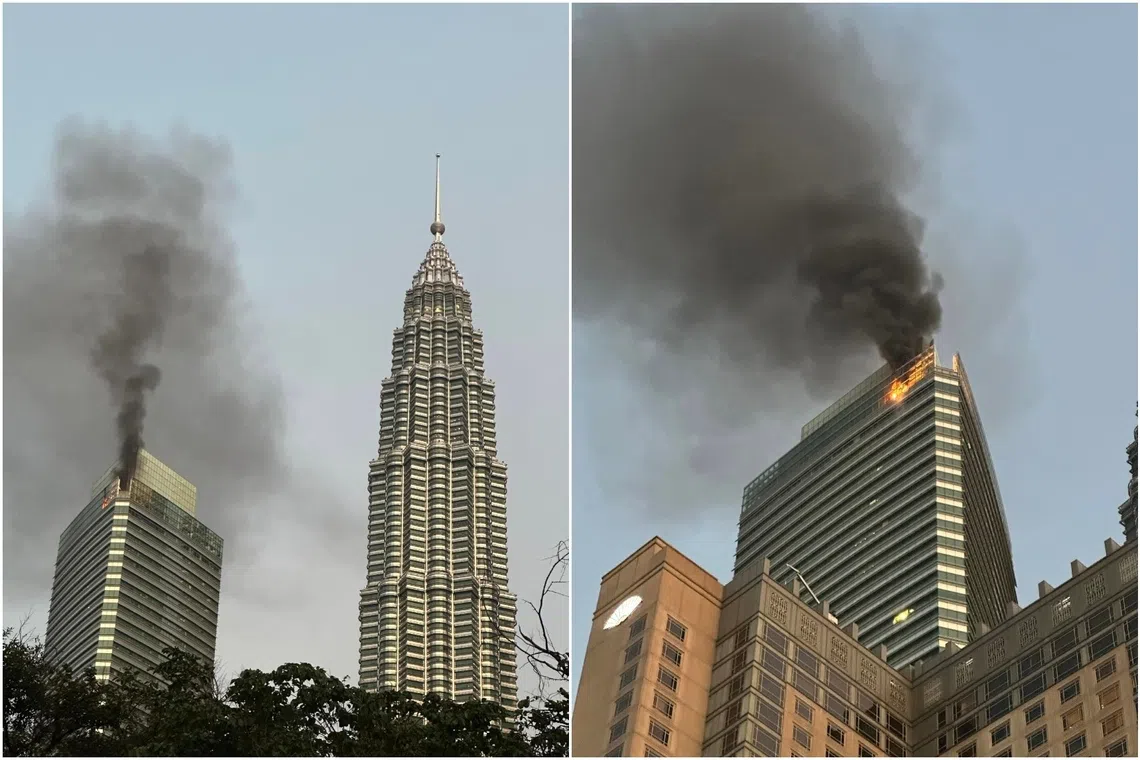 Thick smoke seen billowing from the top of Petronas Tower 3 on the morning of Nov 1.
