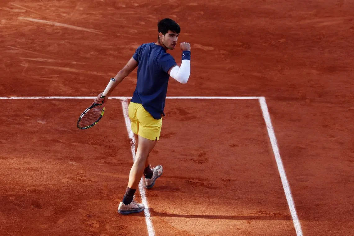 Tennis - French Open - Roland Garros, Paris, France - June 9, 2024 Spain's Carlos Alcaraz reacts during the men's singles final against Germany's Alexander Zverev REUTERS/Yves Herman