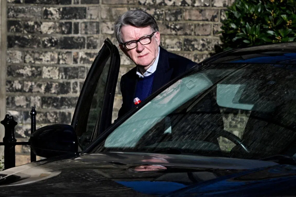 FILE PHOTO: Former British Ambassador to the U.S. Peter Mandelson enters a vehicle outside a reported residence, after police launched a misconduct in public office investigation following the release of U.S. Justice Department files linked to the late financier and convicted sex offender Jeffrey Epstein, in London, Britain, February 14, 2026. REUTERS/Chris Ratcliffe