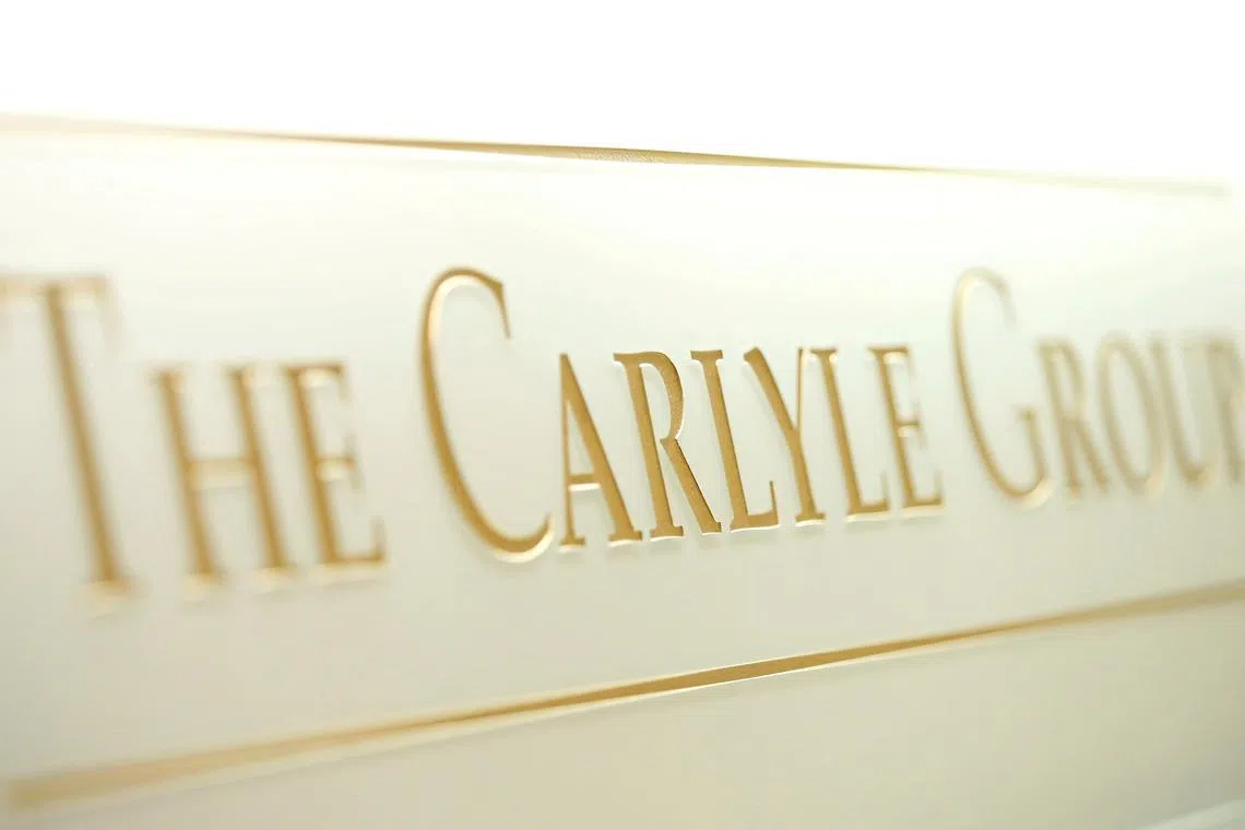 United States buyout firm Carlyle Group is in talks to pick up a minority stake in Manchester United, Sky News reported.