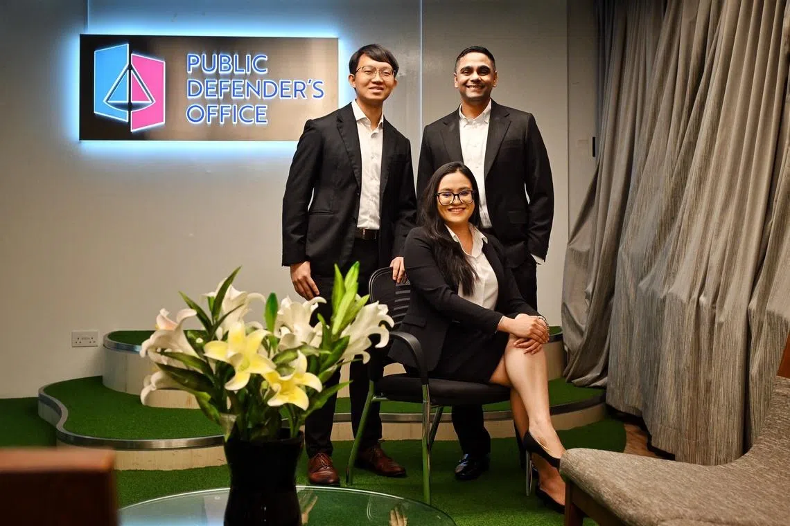 (Clockwise from left) Assistant Director (Criminal Defence) Chong Shou En, Senior Assistant Director (Criminal Defence) Ashwin Ganapathy and Senior Executive (Criminal Defence) Victoria Tay.