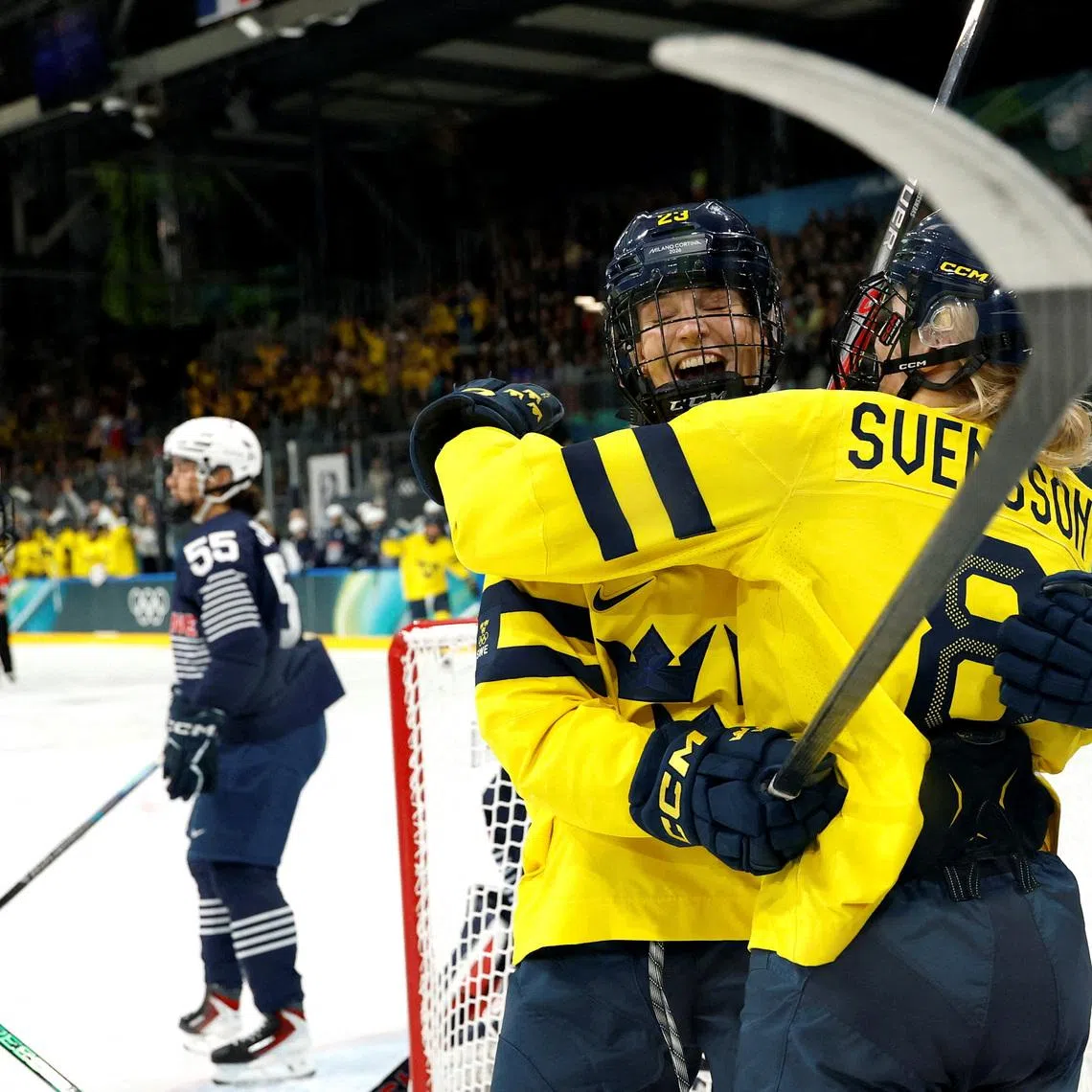 Milano Cortina 2026 Olympics - Ice Hockey - Women's Preliminary Round - Group B - France vs Sweden - Milano Rho Ice Hockey Arena, Milan, Italy - February 08, 2026. Thea Johansson of Sweden celebrates scoring their first goal with Hilda Svensson of Sweden IMAGN IMAGES via Reuters/Geoff Burke