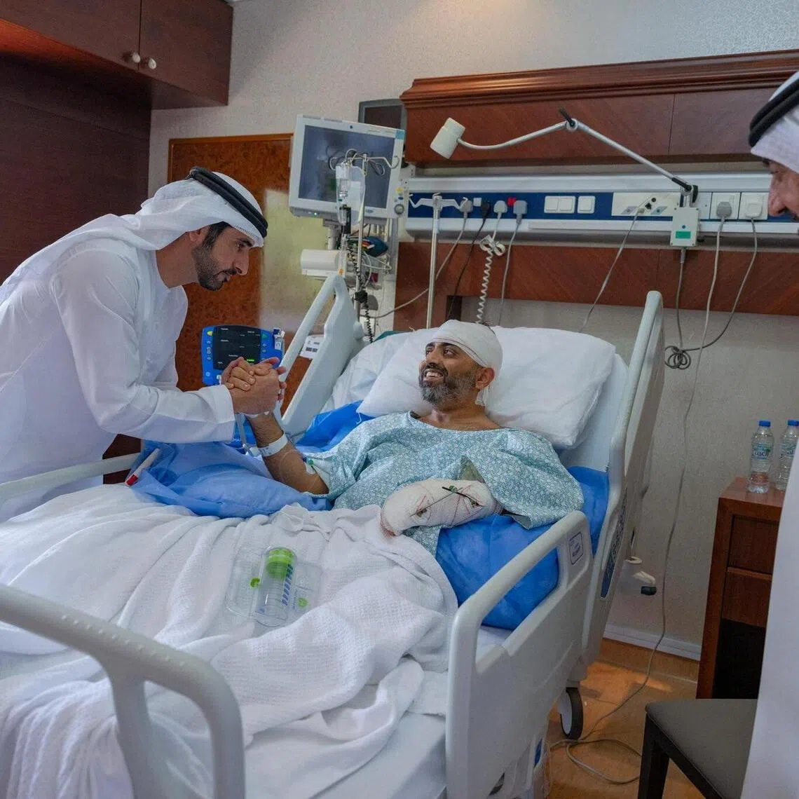 Dubai Crown Prince Hamdan bin Mohammed Al Maktoum meets Indian captain Smit Machchhar after he was stabbed by a colleague aboard a plane.