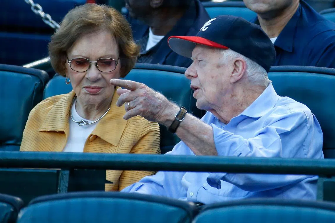 A 2015 photo shows former US president Jimmy Carter and his wife Rosalynn at a baseball match in Atlanta, Georgia.
