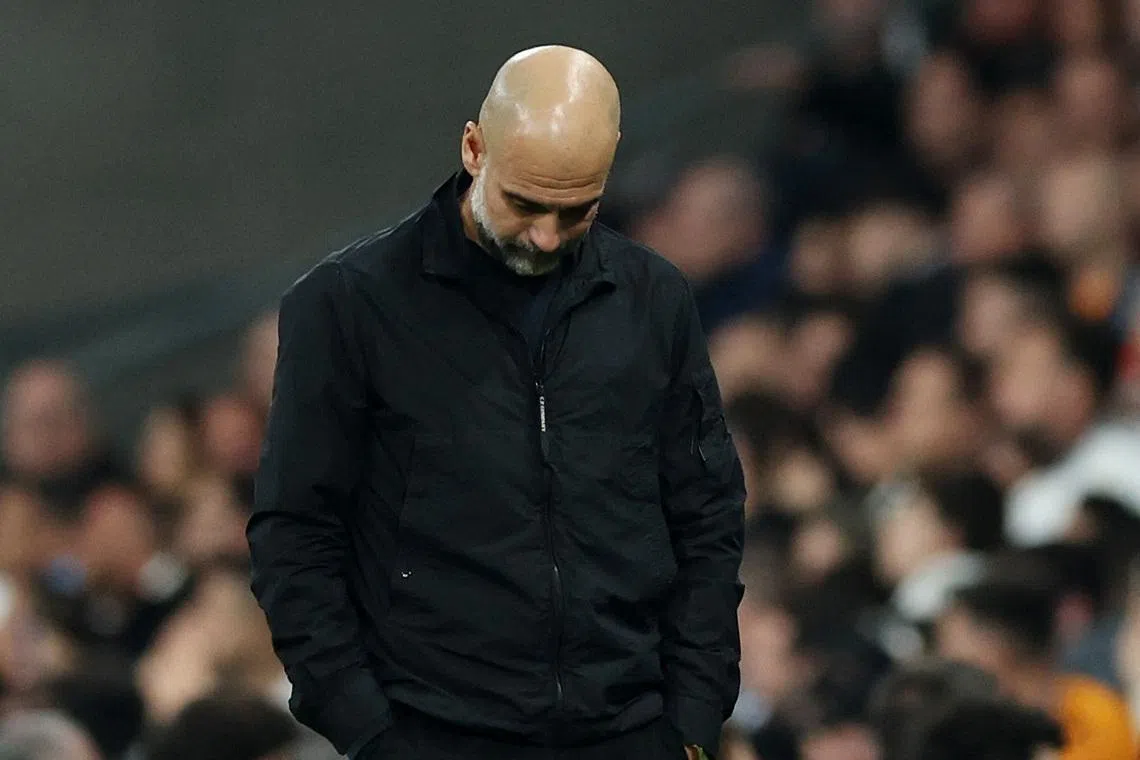 Soccer Football - UEFA Champions League - Round of 16 - First Leg - Real Madrid v Manchester City - Santiago Bernabeu, Madrid, Spain - March 11, 2026 Manchester City manager Pep Guardiola reacts REUTERS/Violeta Santos Moura